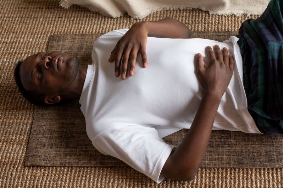 Guided supine breathing exercise with hands on chest and abdomen